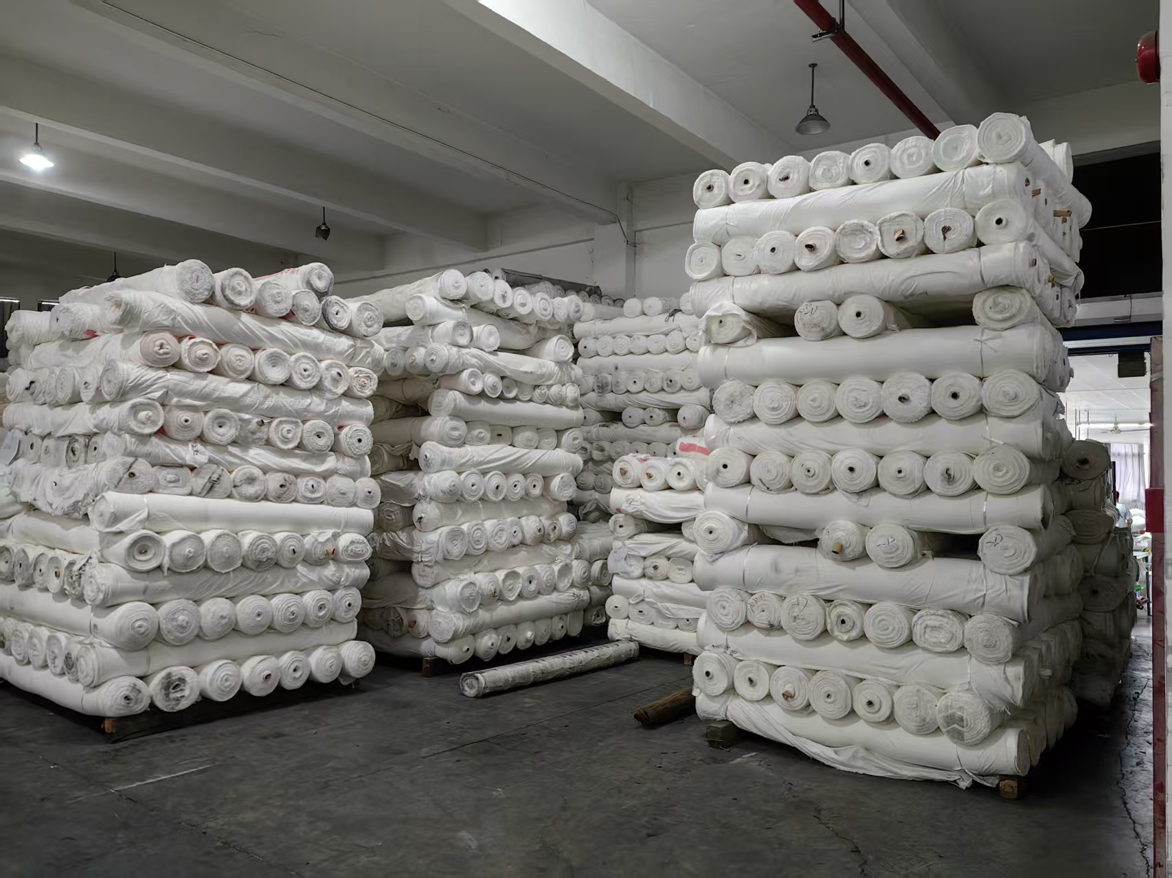 Grey fabric storage area at Fuxing Textile